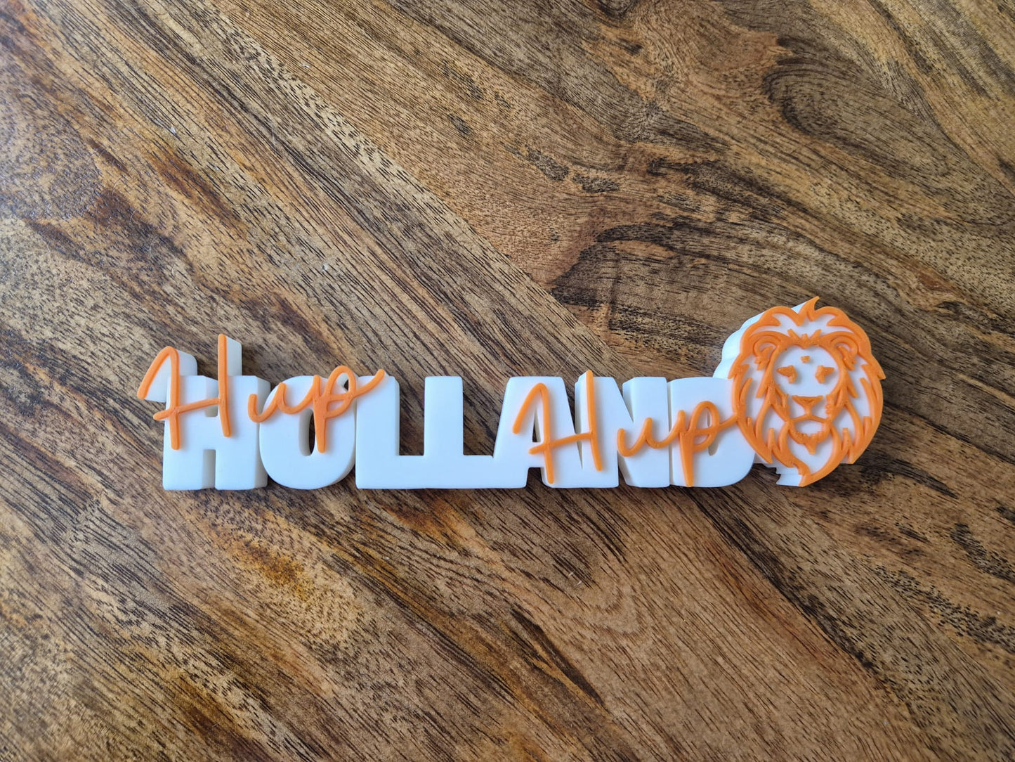 WOORDBEELD HUP HOLLAND HUP MET LEEUW WIT